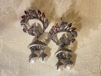 Oxidized silver jhumka earrings with ruby stones and pearl dangles