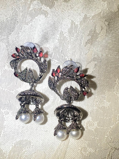 Oxidized silver jhumka earrings with ruby stones and pearl dangles