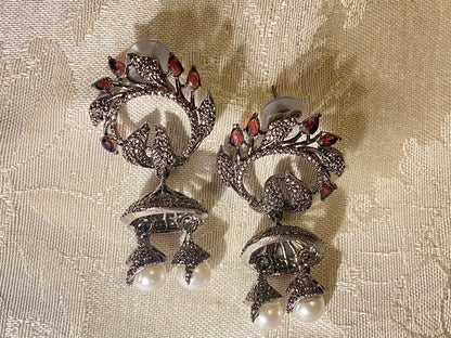 Oxidized silver jhumka earrings with ruby stones and pearl dangles