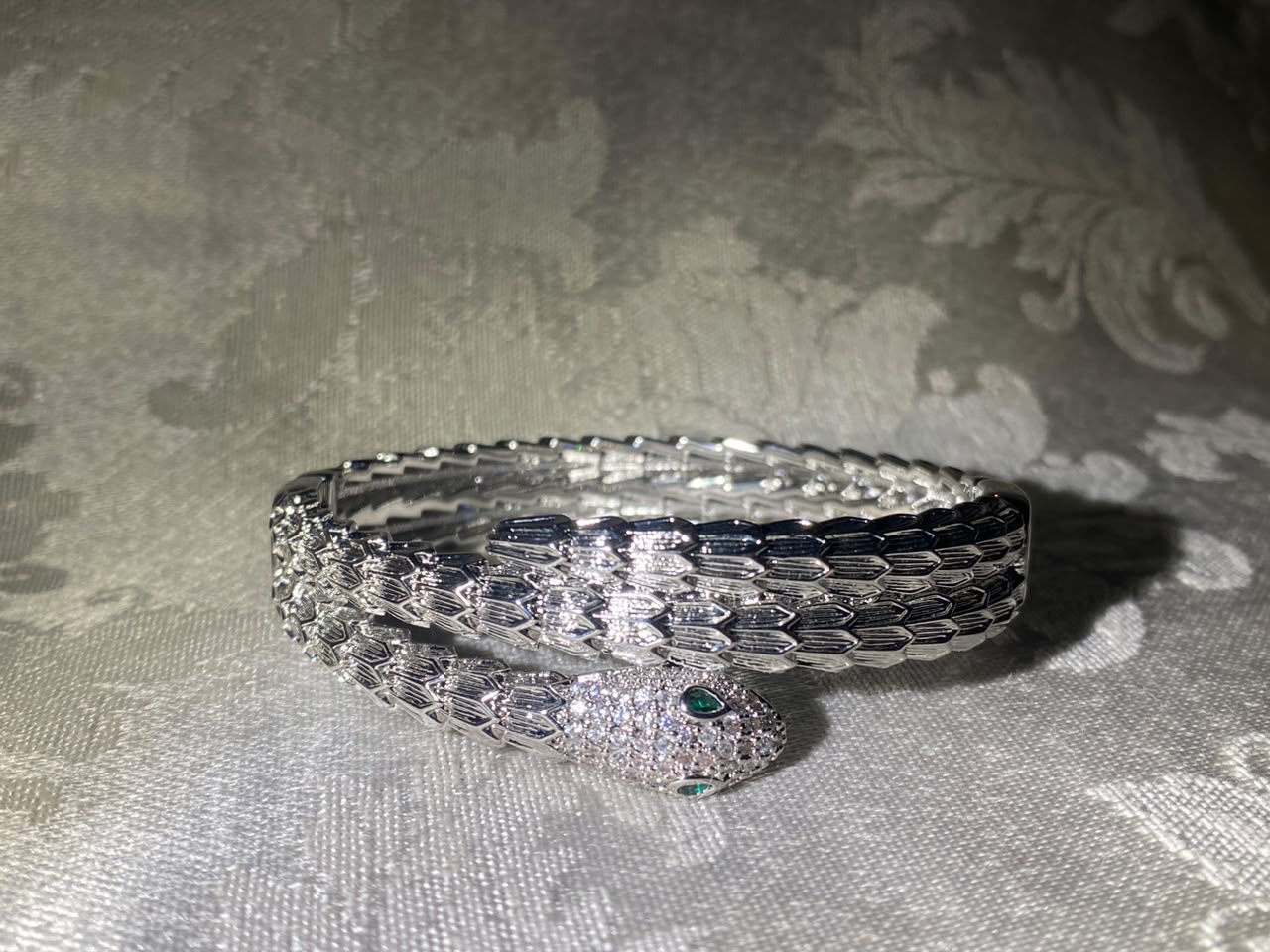 Silver-Tone Snake Bangle Bracelet with Crystal Pavé Head & Green Stone Eyes