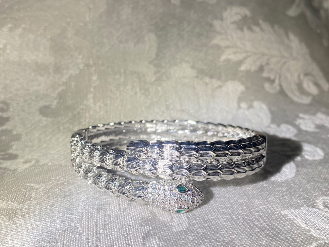 Silver-Tone Snake Bangle Bracelet with Crystal Pavé Head & Green Stone Eyes